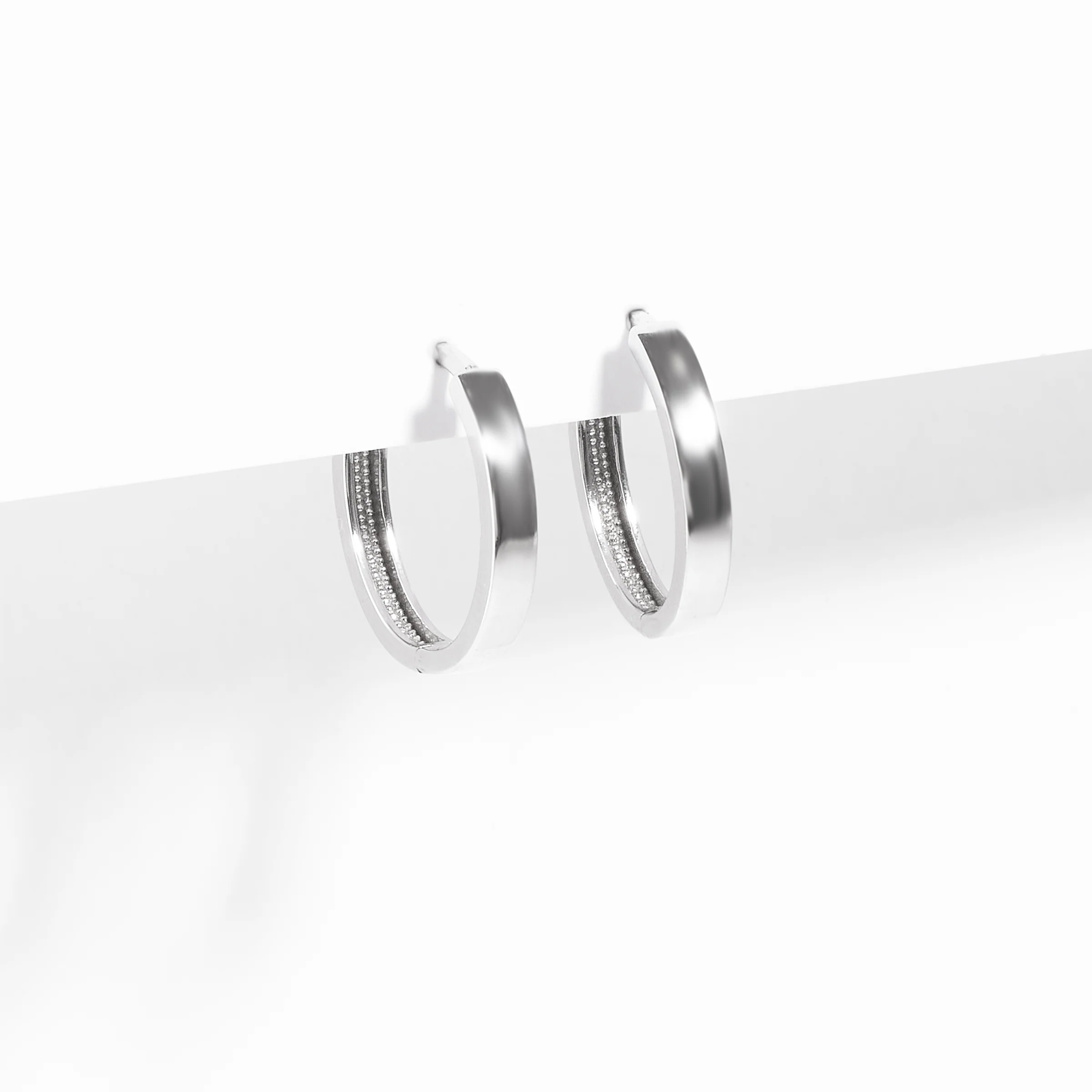 9K White Gold Plain Oval Huggie Earrings 15mm - Image 2