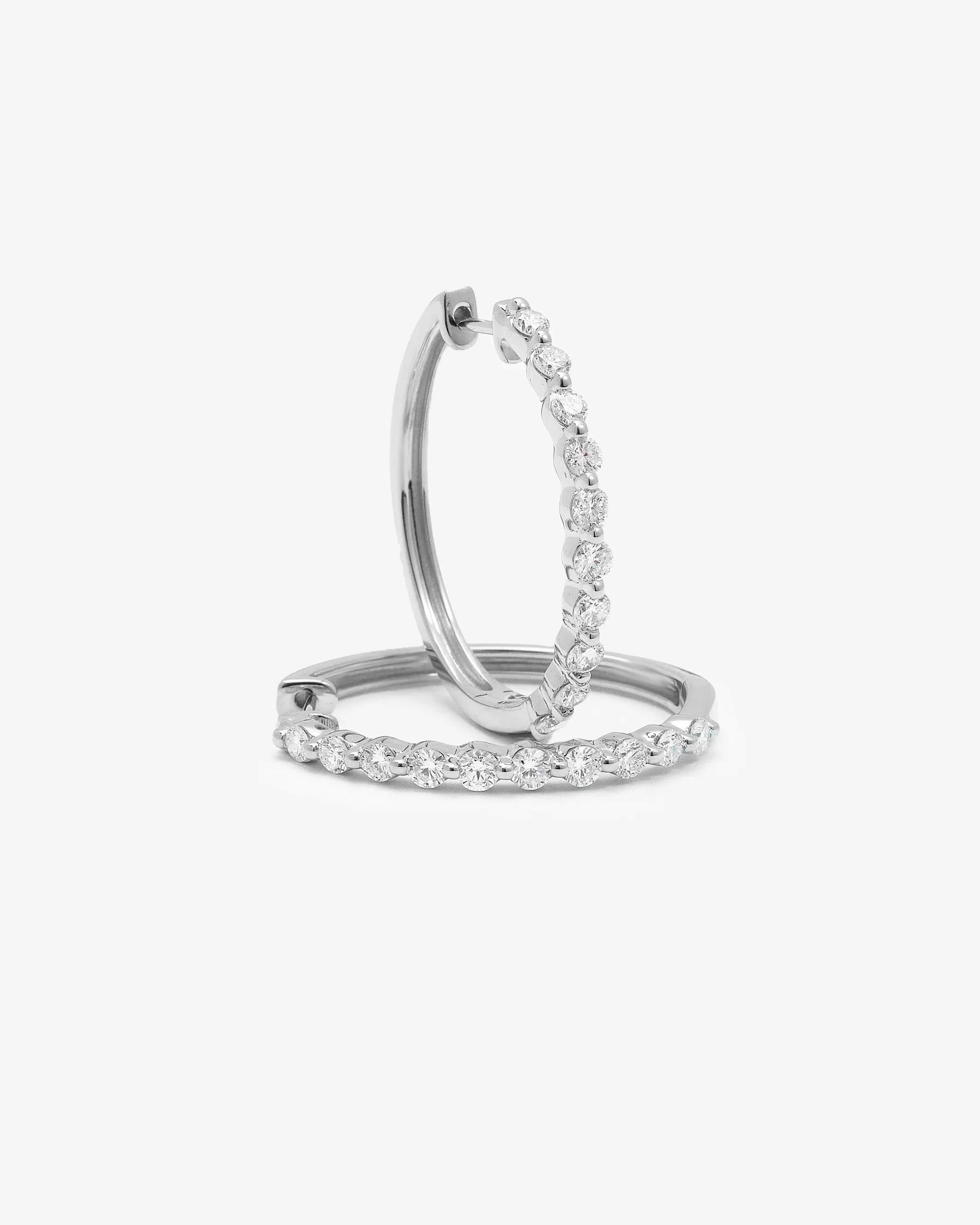 9K White Gold Round Brilliant Floating Lab Diamond Oval Huggie Earrings 1.0tdw