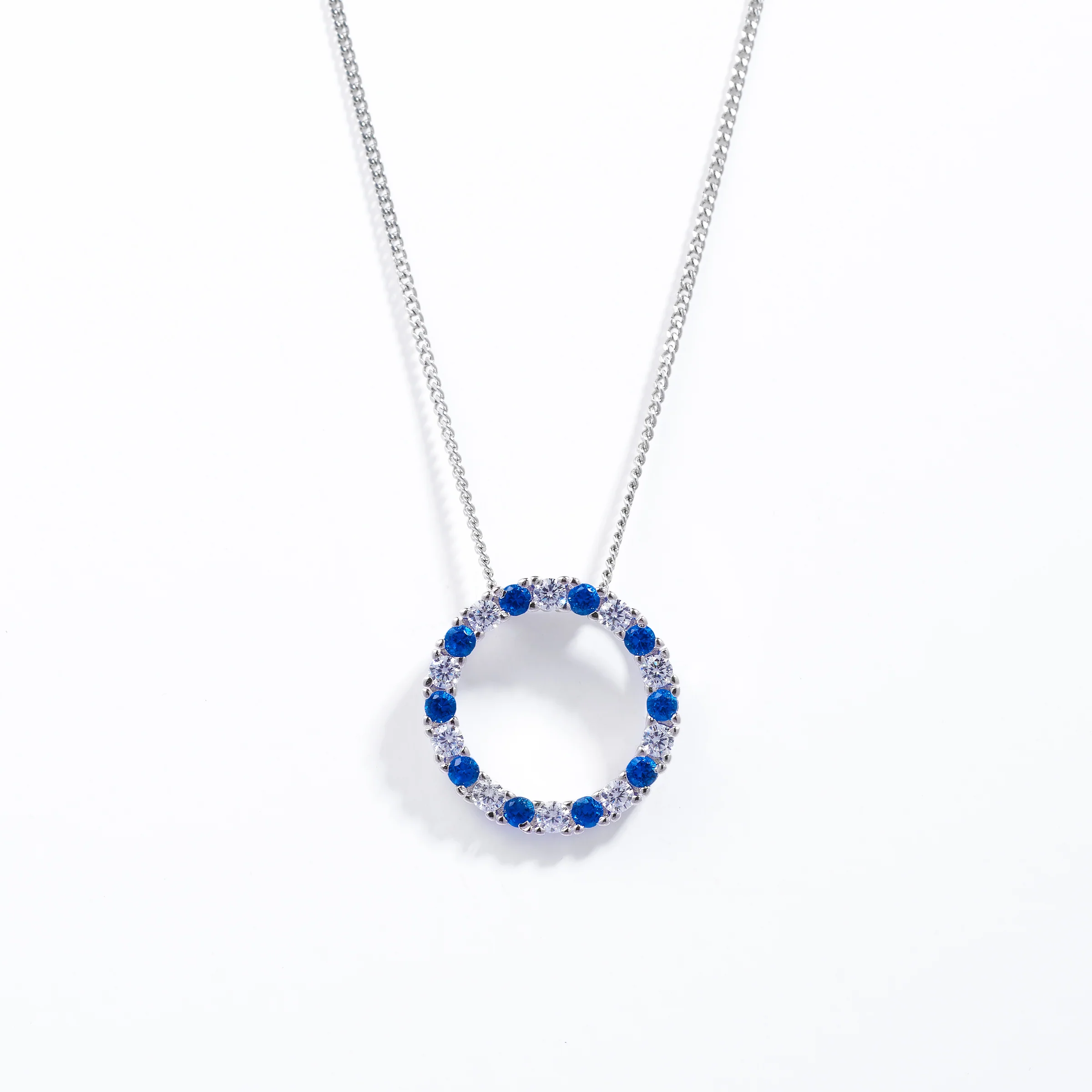 Sterling Silver Blue And White Zirconia Circle Pendant