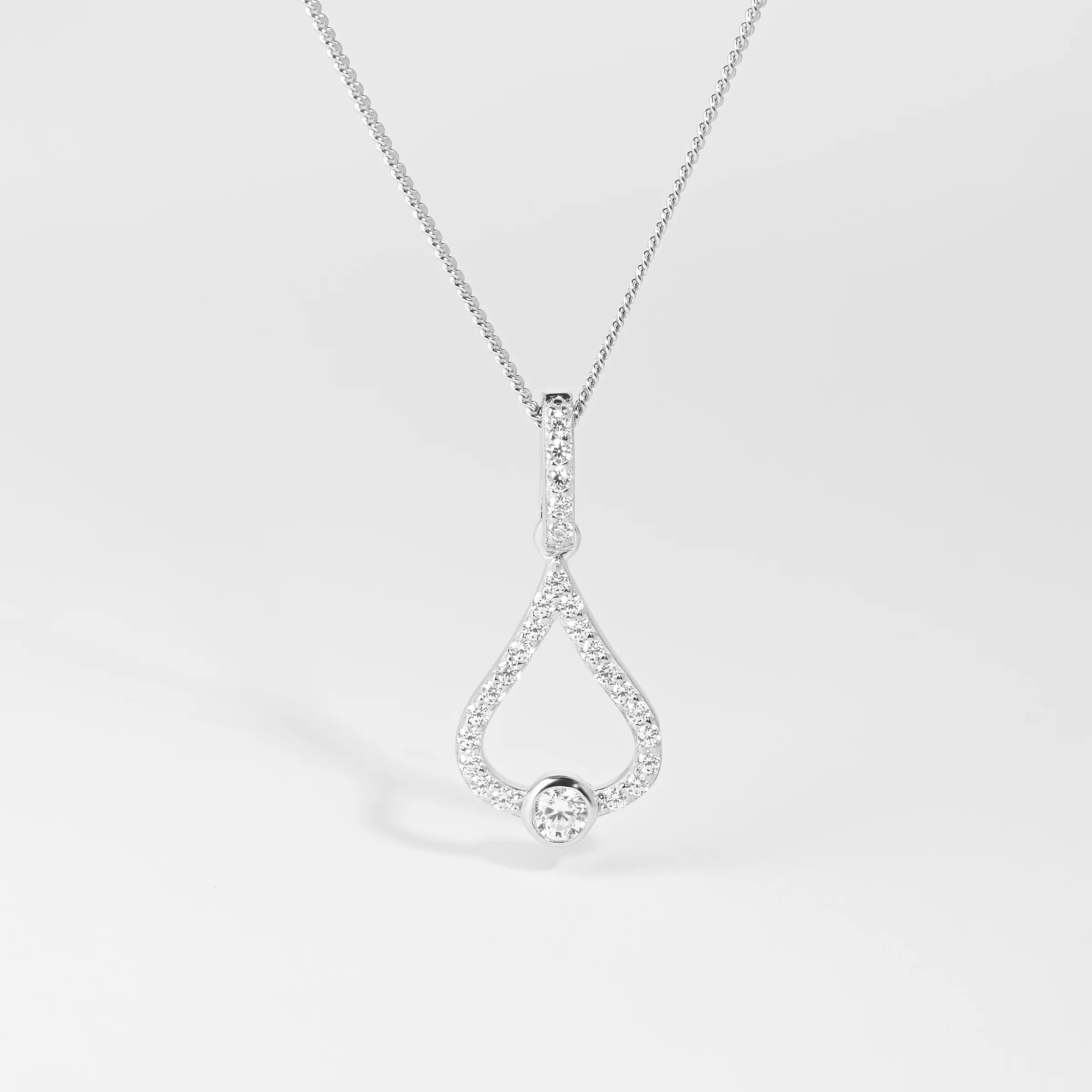 Sterling Silver Zirconia Bezel Open Teardrop Pendant